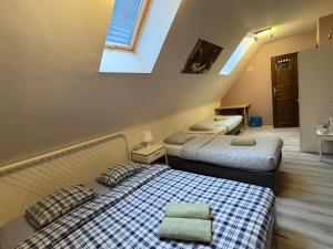 Ένα ή περισσότερα κρεβάτια σε δωμάτιο στο Dreamcatchers Guest Rooms at the Old Town