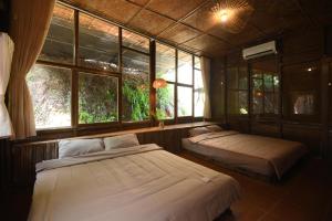 Postel nebo postele na pokoji v ubytování Dinh Gia Trang - Homestay & Coffee