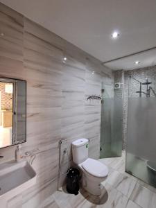 Koupelna v ubytování اقامة تورارن