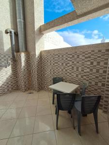 Balkón nebo terasa v ubytování اقامة تورارن