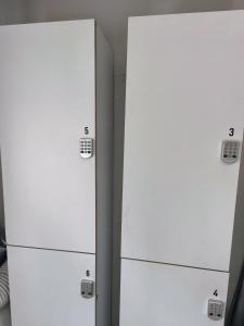 two white drawers in a room next to each other at Buba House in Barcelona +15 photos