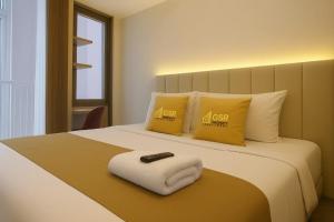 Postel nebo postele na pokoji v ubytování Apartemen TOKYO Riverside PIK2 By GPI