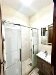 Koupelna v ubytování Ammon Sun Residence + 11 fotografií