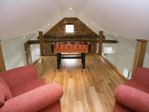 Et opholdsområde på The Street Farm Barn