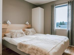 Ένα ή περισσότερα κρεβάτια σε δωμάτιο στο Ski in/Ski out | Sauna | WiFi | Terrace