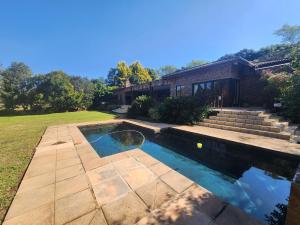 Swimmingpoolen hos eller tæt på Luxury Private Villa - Golf Estate & Leisure