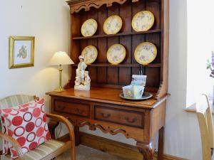 Et opholdsområde på Smithy Cottage + 13 billeder