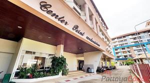 a building with a sign on the front of it at Pattaya Center Point Condo in Pattaya