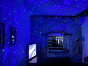 a room with a blue ceiling with stars on the wall at The Sail Loft - Royal William Yard in Millbrook