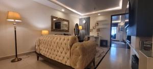 Μια τηλεόραση ή/και κέντρο ψυχαγωγίας στο Goldcrest Hotel Apartments +7 φωτογραφίες