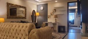 Χώρος καθιστικού στο Goldcrest Hotel Apartments