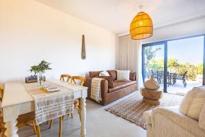 Posezení v ubytování Shells Comfy on-the-beach Hideaway