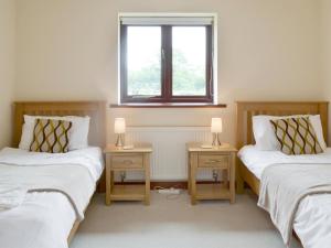 Postel nebo postele na pokoji v ubytování Millers Rest