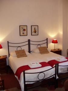 Postel nebo postele na pokoji v ubytování Villino Bianca