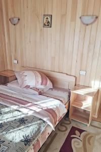 Postel nebo postele na pokoji v ubytování Pensiunea ALEROX