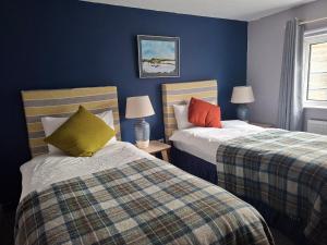 Postel nebo postele na pokoji v ubytování Annaharvey Farm B&B