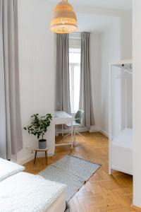 Ένα ή περισσότερα κρεβάτια σε δωμάτιο στο Marschallgasse Top 5