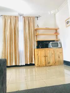 Η κουζίνα ή μικρή κουζίνα στο Tulivu house