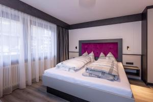 Postel nebo postele na pokoji v ubytování Sieglinde Color