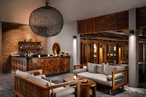 Posezení v ubytování Taj Ganga Kutir Resort & Spa, Raichak