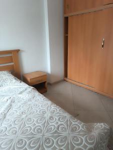 Ένα ή περισσότερα κρεβάτια σε δωμάτιο στο Pleasant apartment, ideal for your stays