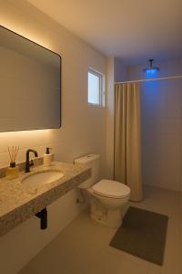 Koupelna v ubytování Village GRAND LUX exclusivo com piscina privativa + 10 fotografií