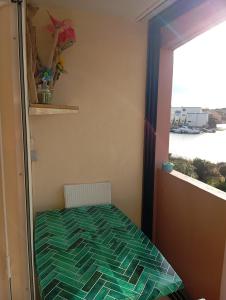 Ένα ή περισσότερα κρεβάτια σε δωμάτιο στο Entre Mer et Étang