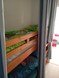 Ένα ή περισσότερα κρεβάτια σε δωμάτιο στο Entre Mer et Étang +14 φωτογραφίες