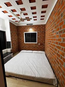 Postel nebo postele na pokoji v ubytování Escape Inn