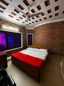 Postel nebo postele na pokoji v ubytování Escape Inn