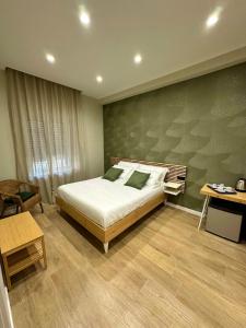Кровать или кровати в номере Silvana Guest House