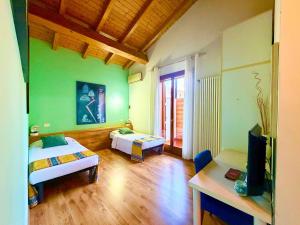 Postel nebo postele na pokoji v ubytování Hotel New Genziana + 91 fotografií