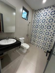 Ένα μπάνιο στο NGHI Homestay