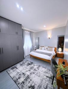 Ένα ή περισσότερα κρεβάτια σε δωμάτιο στο Qstay Luna