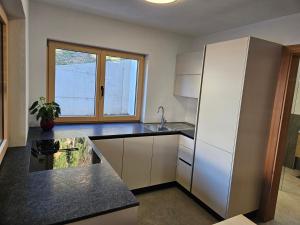 Η κουζίνα ή μικρή κουζίνα στο Apartment Warscher