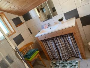 a bathroom with a sink and a mirror at Au Solé in Basse-sur-le-Rupt +90 photos