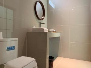 Koupelna v ubytování K's Beach Resort + 24 fotografií