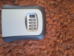 a remote control on top of a wooden floor at UNIJUI in Ijuí +6 photos