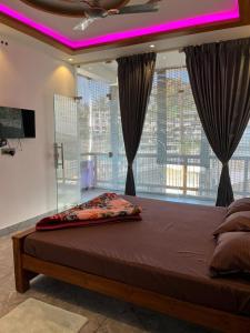 Ένα ή περισσότερα κρεβάτια σε δωμάτιο στο kavi luxury home stay +5 φωτογραφίες