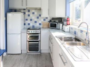 Kuchyň nebo kuchyňský kout v ubytování Rockvale 2 + 8 fotografií