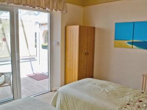 Ένα ή περισσότερα κρεβάτια σε δωμάτιο στο Greenhaven +7 φωτογραφίες