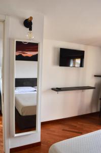 Ένα ή περισσότερα κρεβάτια σε δωμάτιο στο Gioia's House