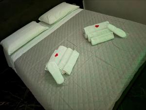 Postel nebo postele na pokoji v ubytování Belvedere Lacinio Guest House + 53 fotografií