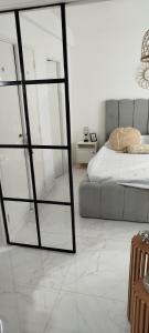 Ένα ή περισσότερα κρεβάτια σε δωμάτιο στο Bolivar Beach - Mar del Plata +2 φωτογραφίες