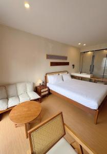 Postel nebo postele na pokoji v ubytování Aya Beach Resort Koh Lipe