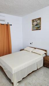 Postel nebo postele na pokoji v ubytování Belmaison