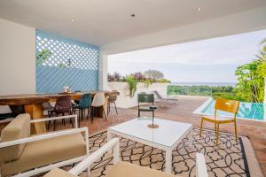 Posezení v ubytování Piece of Paradise