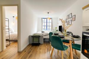 Postel nebo postele na pokoji v ubytování Le Logis Des Remparts Appartement neuf