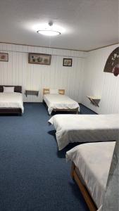 Ένα ή περισσότερα κρεβάτια σε δωμάτιο στο Minpaku ayu B