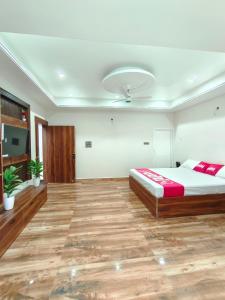 Ένα ή περισσότερα κρεβάτια σε δωμάτιο στο The Bliss Room 107 , Zero mile